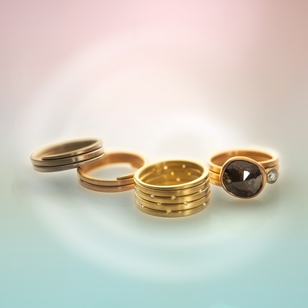 Ribbon Eternity Ring- Fairtrade Gold with diamonds by Cox and Power Jewellers London