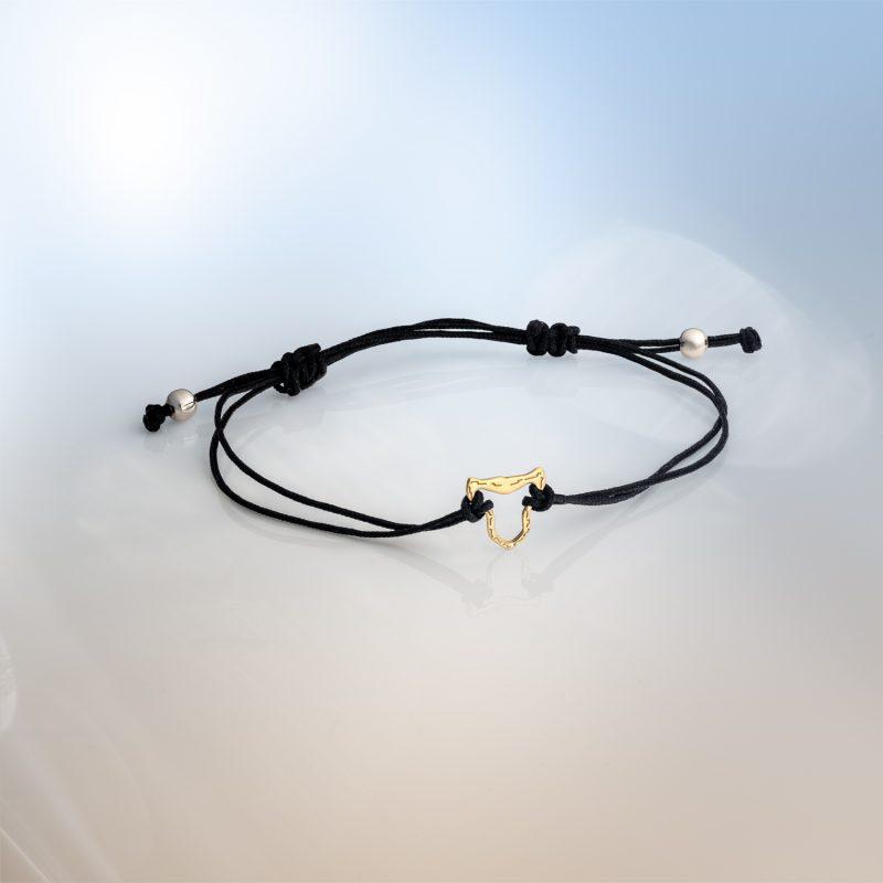 18ct Fairmined gold jaguar head charm on adjustable black macrame bracelet