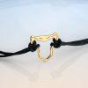 18ct Fairmined gold jaguar head charm on adjustable black macrame bracelet