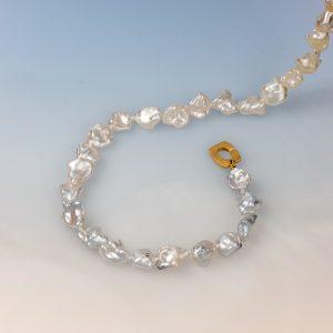 Keshi South Sea pearl necklace with a gradient of natural tones and a rectangular 18ct yellow gold clasp
