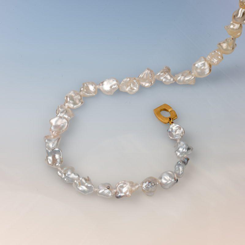 Keshi South Sea pearl necklace with a gradient of natural tones and a rectangular 18ct yellow gold clasp